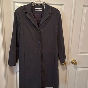 Vintage suit— very long (coat length) jacket, and a maxi skirt.